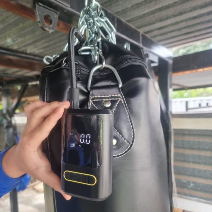 Filling the WAIP Boxing Bag with air using the included pump